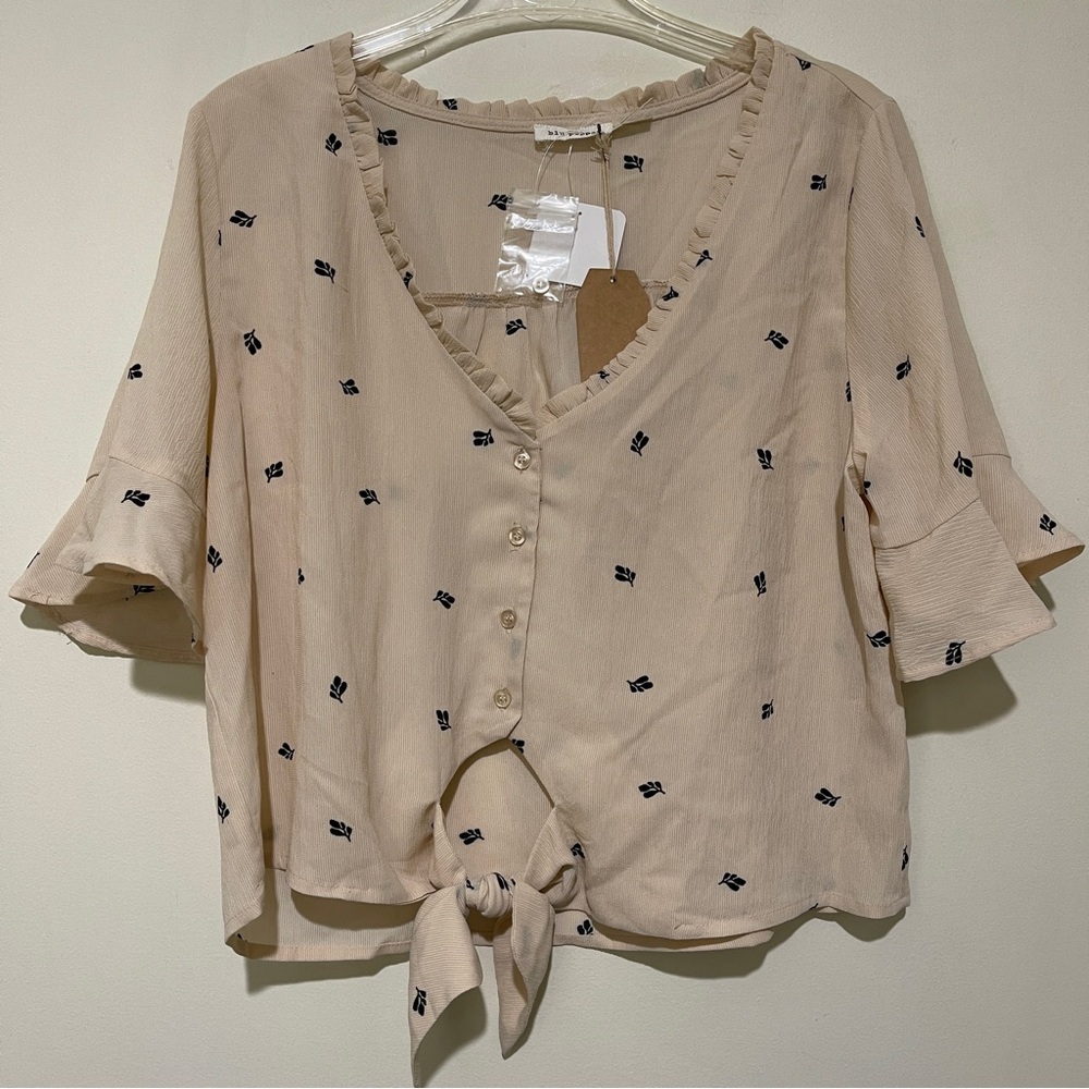 Blu Pepper Cream Tie-Front Blouse with Black Floral Accents